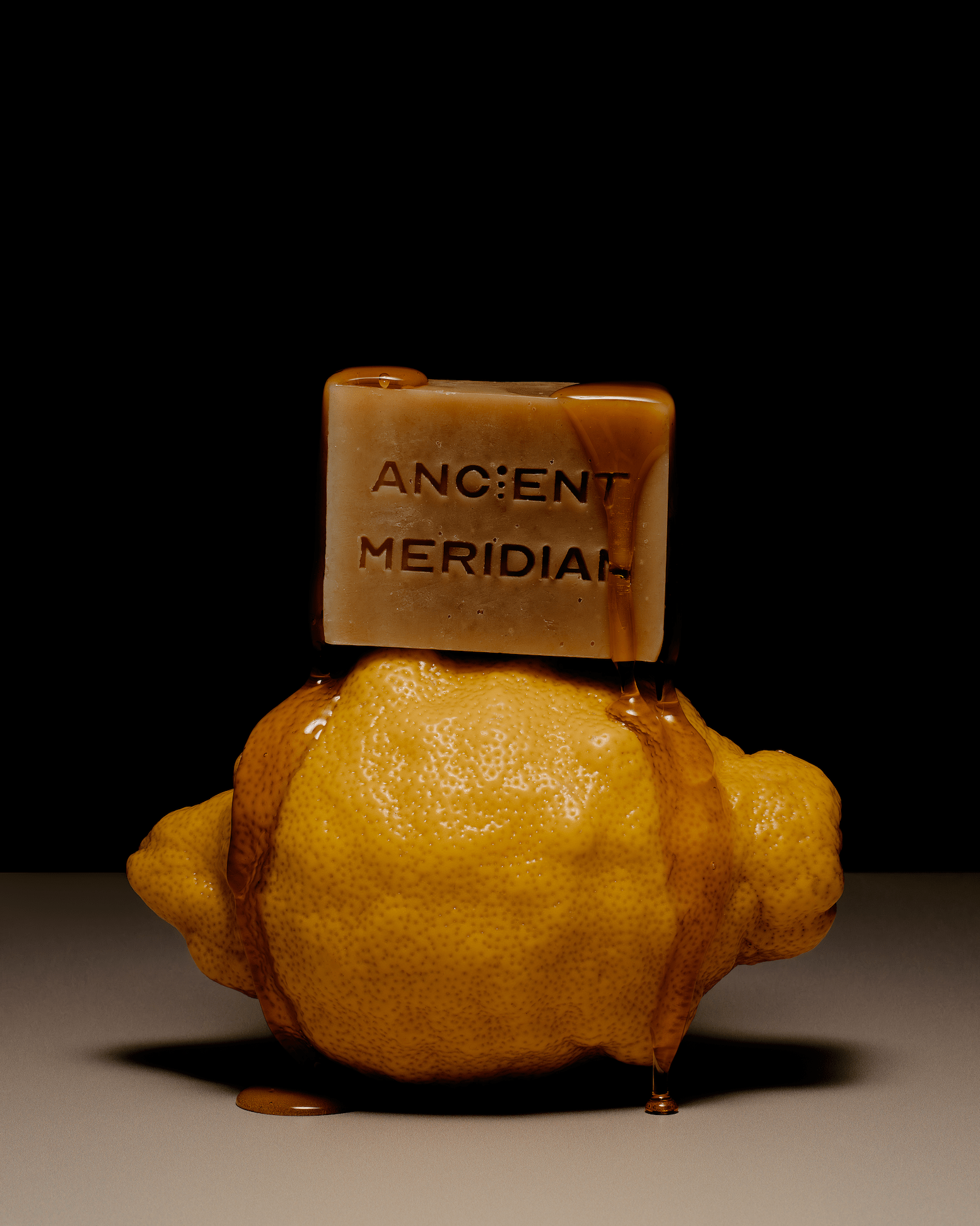 Ancient Meridian Ayaan honey soap brick styled on natural surface – radiant milk-and-honey bar soap with vanilla and cardamom, Here & Always