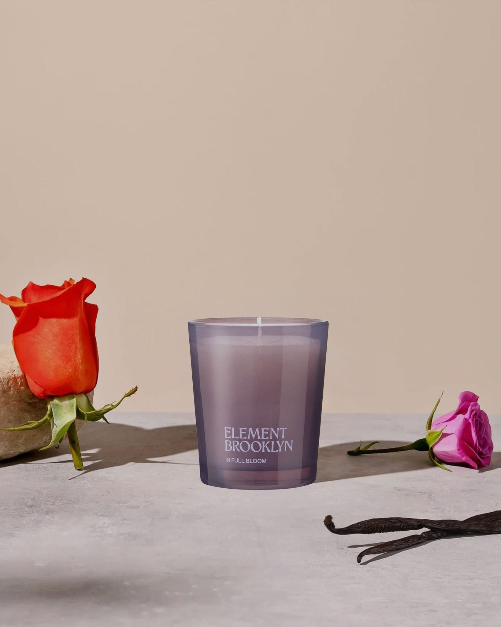 In Full Bloom Candle styled on natural surface – blackcurrant, rose and cedar soy candle from Baobab & Rose gift set, Here & Always