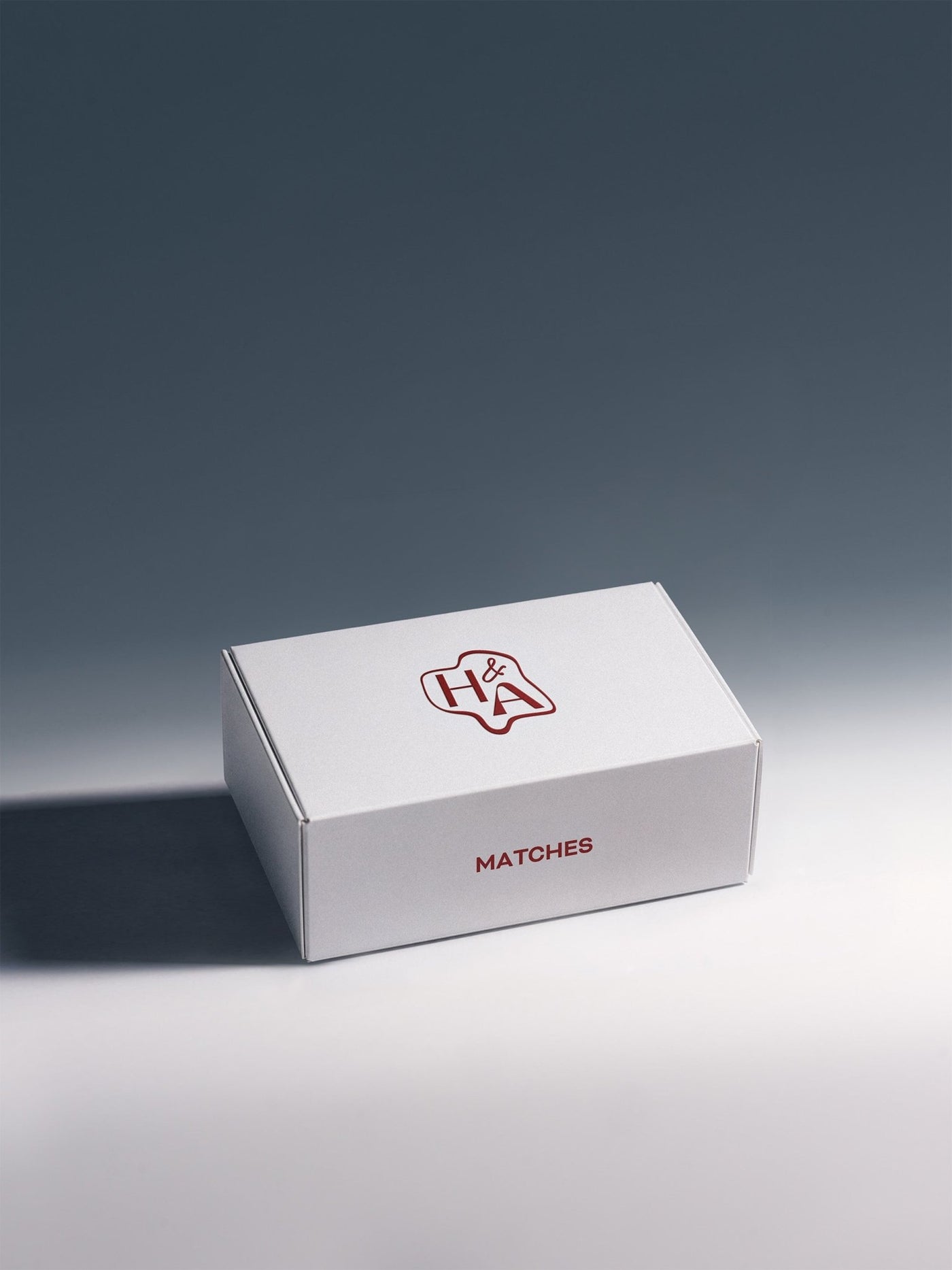Matchbox refill kit with 100 matches and 2 replacement strikers for Here & Always personalized matchbox, studio shot on neutral background.