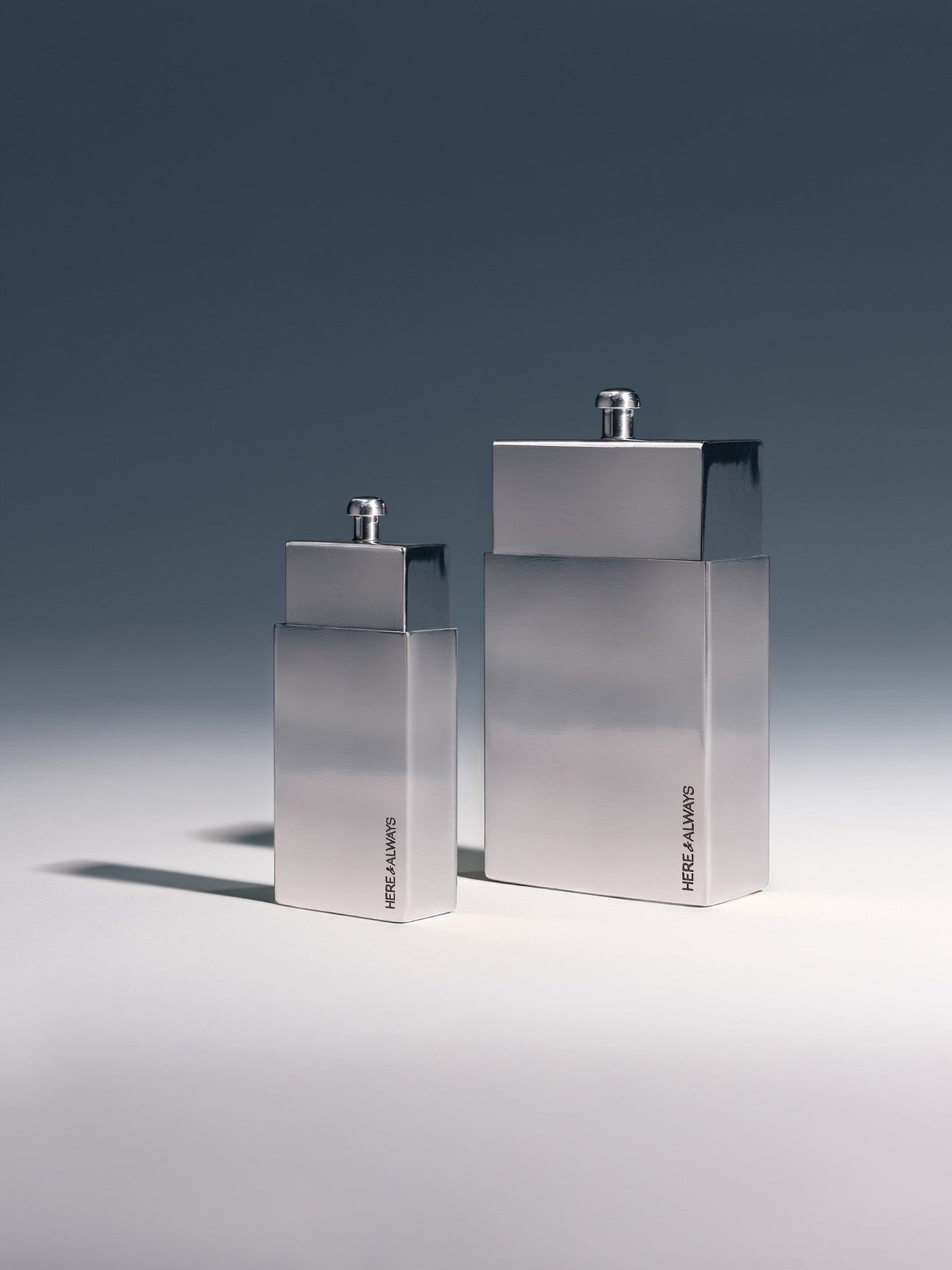 Rear view of Little and Big polished silver matchbox showing Here & Always brand signature engraving, studio shot | Here & Always